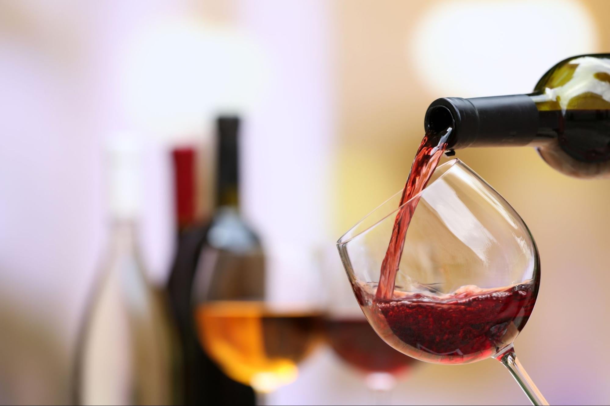 Mature Red Wine Being Poured