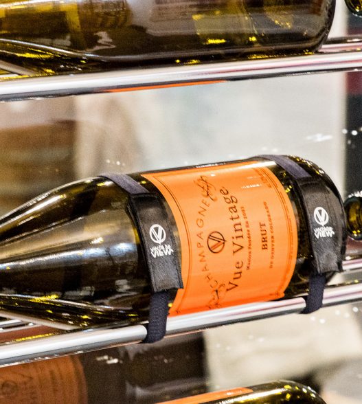 W Series Wine Bottle Retention Straps in Wine Wall